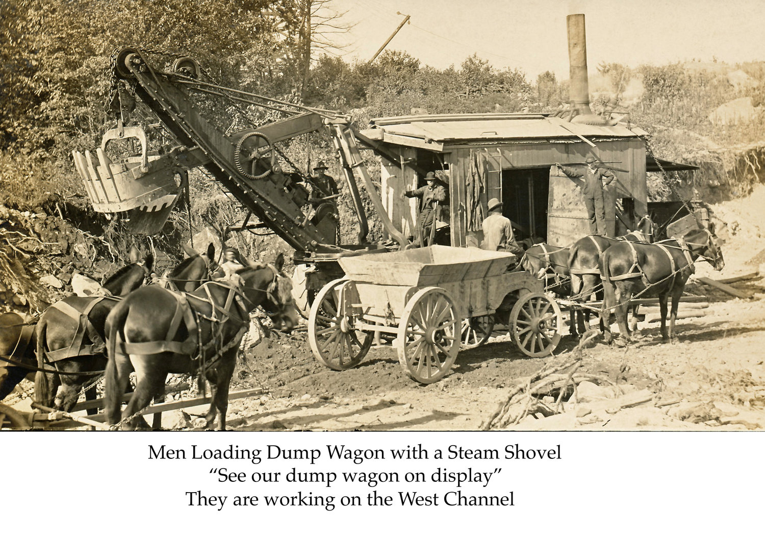 Loading a dump wagon with a steam shovel. They're working on the west channel of the Ashokan.